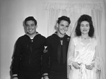 Jack Watkins, Shipfitter Third Class, and the bridal couple, Neal Wayne Shockley, Gunner's Mate Third Class, and his bride, the former Miss Corene Scott