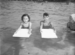 Red Cross swimming classes. Mary West and Freddie Stockdale receiving beginner's instructions