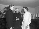 Lieutenant Larry Thomas White Junior of the Salvation Army and his bride, the former Miss Edith Hogg, and Brigadier Ray Gearing