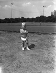 Benny Allen Jones, 20 month old son of Sergeant B. G. Jones, enjoying a sun bath on July 4, 1944