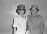 Mrs. Elizabeth Passmore, executive secretary of Lena Pope Home, Women's Army Corps (WAC) and her daughter Mrs. Jayne Bryant in the Marines