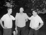 W. C. O. Harris, former coach at Carter Riverside, center, and football players Jimmy Hunt, left and Leo Holliday, right