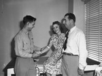 Red Cross Blood Donor Center. First Lieutenant Jack Rollow, left shown with his wife and her father, Leroy Olmsted, chairman of Blood Donor Center