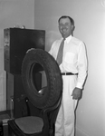 R. T. Nail shown with tire