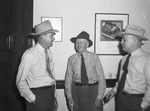 Armour & Company. T. J. Wallace, retiring sheep buyer, A. A. Lund, and J. L. Vestal by Frank Reeves Sr.