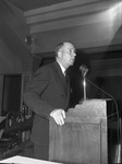R. L. Bowen, president of Texas State Council of the National Aeronautic Association, shown at the microphone
