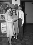 United States Constitution Quiz Contest. Miss Grace Becker, American history teacher at Arlington Heights High School, with Betty Leader and Harry Porter