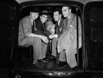 Men in a Vehicle