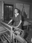 Mrs. Frances Aycock, weaving a rug at the Lighthouse for the Blind