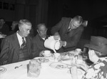 E. B. Trimble serving coffee to G. M. Cummins and William Fralick