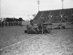 "Here's Yours Infantry" A heavy machine gun and crew shown in action.