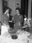 Our Lady of Victory Academy open house. Miss Rose Mary Tunnell serving punch to Mrs. George Byron