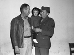John W. Jiles, left, and his small daughter, Sandra Kay, shown with Jiles' brother, Corporal Dock Jiles.