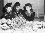 Mrs. Lonnie Hicks, Miss Elizabeth Bryan and Miss Iris Alexander, all of the Civilian Army Air Force personnel at Consolidated Vultee Aircraft Corporation.