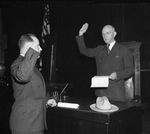 Al Clyde. district attorney taking oath of office