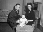 Lieutenant and Mrs. Don Colwell and son, Keith of Bakers- field, California.