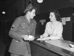 Tech. Sgt. Fred Yaggi and Mrs. W. C. Rogers at SMC