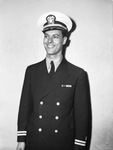 Lieutenant Leslie J. Helbing, USNR, dental officer.