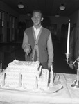 Fort Worth Boys Club. Birthday celebration Billy Burklow, cutting cake.