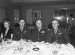 Pilot. reunion. Left to right, Lieutenant P. A. Dlougosch, Storm Lake, Iowa; Captain C. E. Cobb, Broken Arrow, Oklahoma; and Lieutenant A. J. Dexter, Saint Paul, Minnesota.