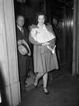 Branson kidnapping case. Mrs. C. E. Branson carrying Milly McGill.