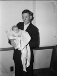 Branson kidnapping case. C. A. McGill holding his infant daughter, Milly McGill