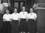 Our Lady of Victory Favorites and Yearbook Staff: Jean Foote, Martha Kelly, Bettejane Mueller, and Mildred Shaw