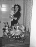 Mrs. Margie Rigdon and son, Robert Joseph Rigdon Jr., shown with souvenirs