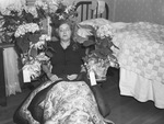 Mrs. H. B. Balch, shown with her Easter flowers.