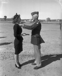 Major General Bruce Magruder awarding medal to Mrs. Geneva Keathley