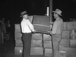 Used Clothes collection. William Holden, left, and Preston Hodges, lifting boxes of clothing