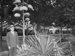 Walter Mixon with 12-foot century plant