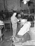 Magnesium Manufacturing Company: Virgil Smith, working on sheet metal