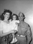Staff Sergeant and Mrs. John Everett of Dallas, and daughter, Sharon Jane