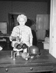Mrs. W. H. Bransford looking at German equipment