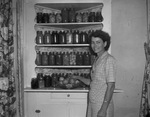 Mrs. David McGee and her display of canned goods