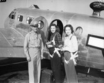 Maj. Charles P. Marston (left) with Eleanor Wilson and Mrs. Catherine Gunn who represent Fort Worth Star Telegram at Fort Worth Army Air Field next to AT -7 transport plane, 08/21/1945