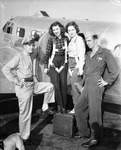Capt. Jack Dozier (left) pilot of AT-7 transport plane with Star-Telegram war correspondent representatives Eleanor Wilson and Catherine Gunn; Staff Sgt. James C. McMillen, crew chief at Fort Worth Army Air Field