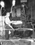 John Bonner operates a nail-driving machine at Fort Worth Quartermaster Depot