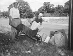 City cleanup campaign: H. D. Pope and his son David