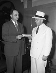 Charles Needham, presenting check to O. P. Newberry, treasurer of Fort Worth committee of the American Cancer Society