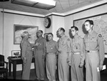Lieutenant General Barton K. Young awarding decorations to officers