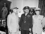 Lieutenant General Harold L. George, Major General M. S. Fairchild and Colonel J. M. McDonnell
