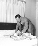 Captain Eugene C. Camp and infant daughter