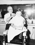 George Jennings of the All-Church Home, getting his haircut by D. F. Park