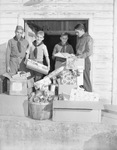 Boy Scouts delivering Christmas gifts