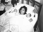 Mrs. G. W. Hilton with newborn twins