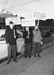 Western Electric Company strike picketers. Left to right, T.E. Rucker, Jerry Bracken and R.E. Gann
