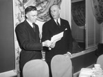 Henry H. Heimann, and J. W. Blackwell, right, attend a meeting of the Fort Worth Association of Credit Men