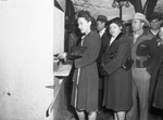 Armour and Company employees Miss Jane Cochran, left, and Miss Edythe Hinch receiving pre-strike pay
